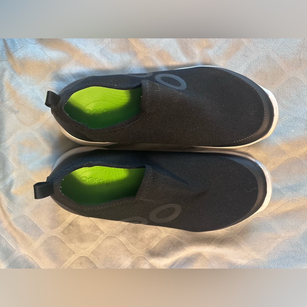 Oofos Women’s OOmg eeZee Slip-on shoes.